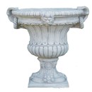 Vase avec anneaux et tête gargouille sur pied carré