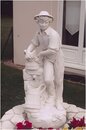Statue de jardin en pierre Homme : Le Puiseur