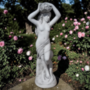 Statue femme dénudée  tenant des roses sur sa tête
