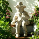 Statue de jardin en pierre grand-pere-Assis