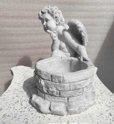 Statue Ange et son pot de fleurs