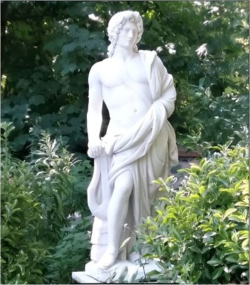 Statue-en-pierre-Homme- Le Musicien