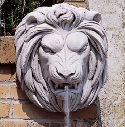 Tête de lion fontaine murale