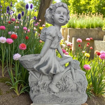 Statue fillette à bicyclette