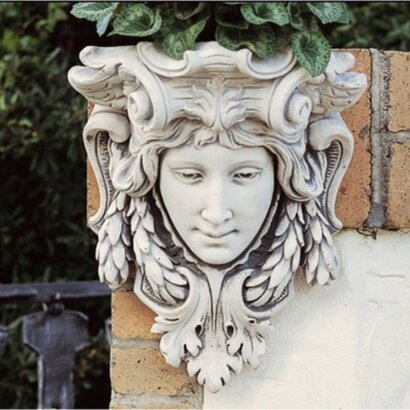 Statue en pierre  Mascaron tête de femme 