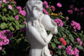 Statue de jardin en pierre Jeune Fille au coquillage