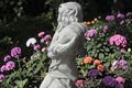 Statue de jardin en pierre Jeune Fille au coquillage